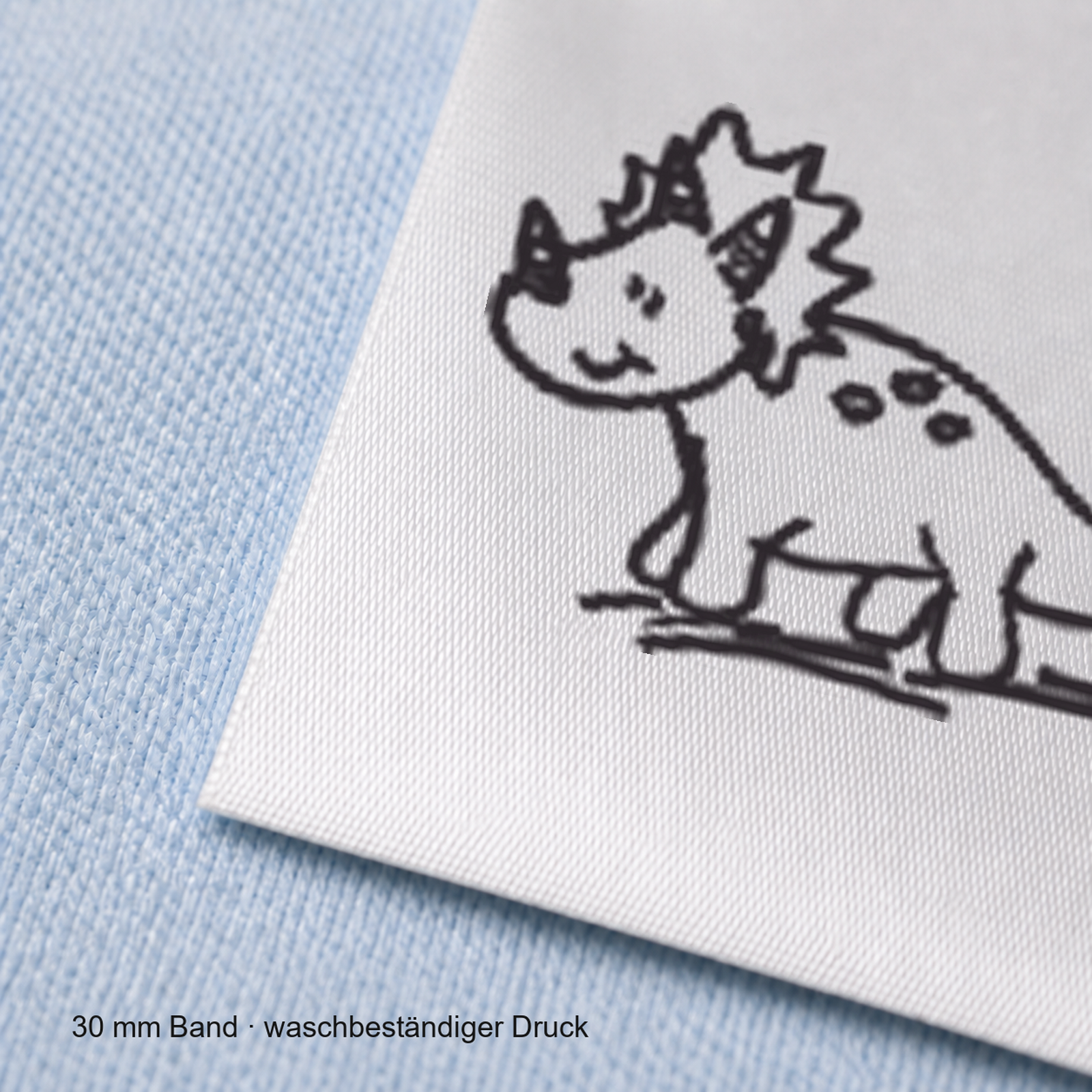 Textiletiketten mit Dino Triceratops Motiv zur Größenbeschriftung 6 Textiletiketten mit Dino Triceratops Motiv zur Größenbeschriftung – Materialqualität